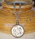 Necklace with pocket watch style pendant