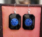 Earrings made with mid century glass medallions