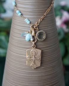 Necklace made with antique locket and baby blue Amazonite stones