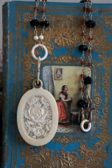 Necklace made with ivory mirror locket