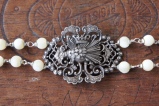Bracelet made with porcqupine brooch and mother of pearl beads